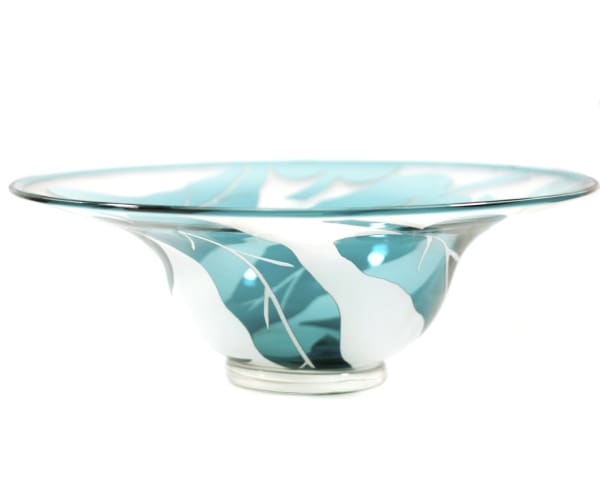 A glass bowl with blue and white design on it.