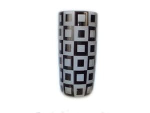 A black and white vase with squares on it
