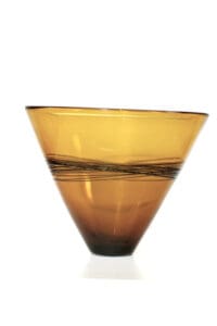 A brown glass bowl with a black stripe on the bottom.