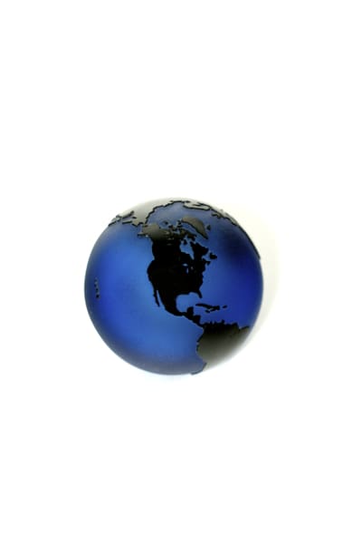 A blue globe with black continents on it.