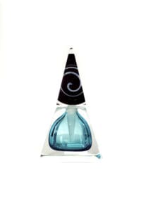 A blue glass bottle with black swirl on top of it.