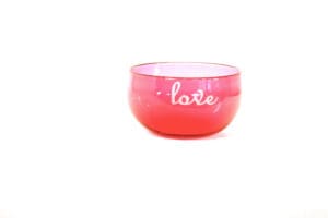 A bowl that says love on it.