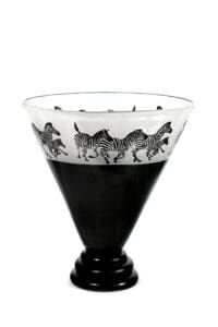 A black and white glass with zebra design