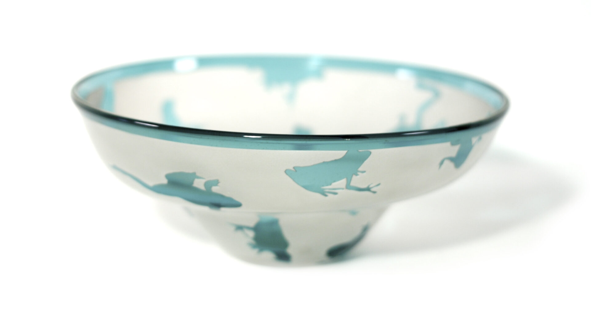 A bowl with a blue and white design on it.