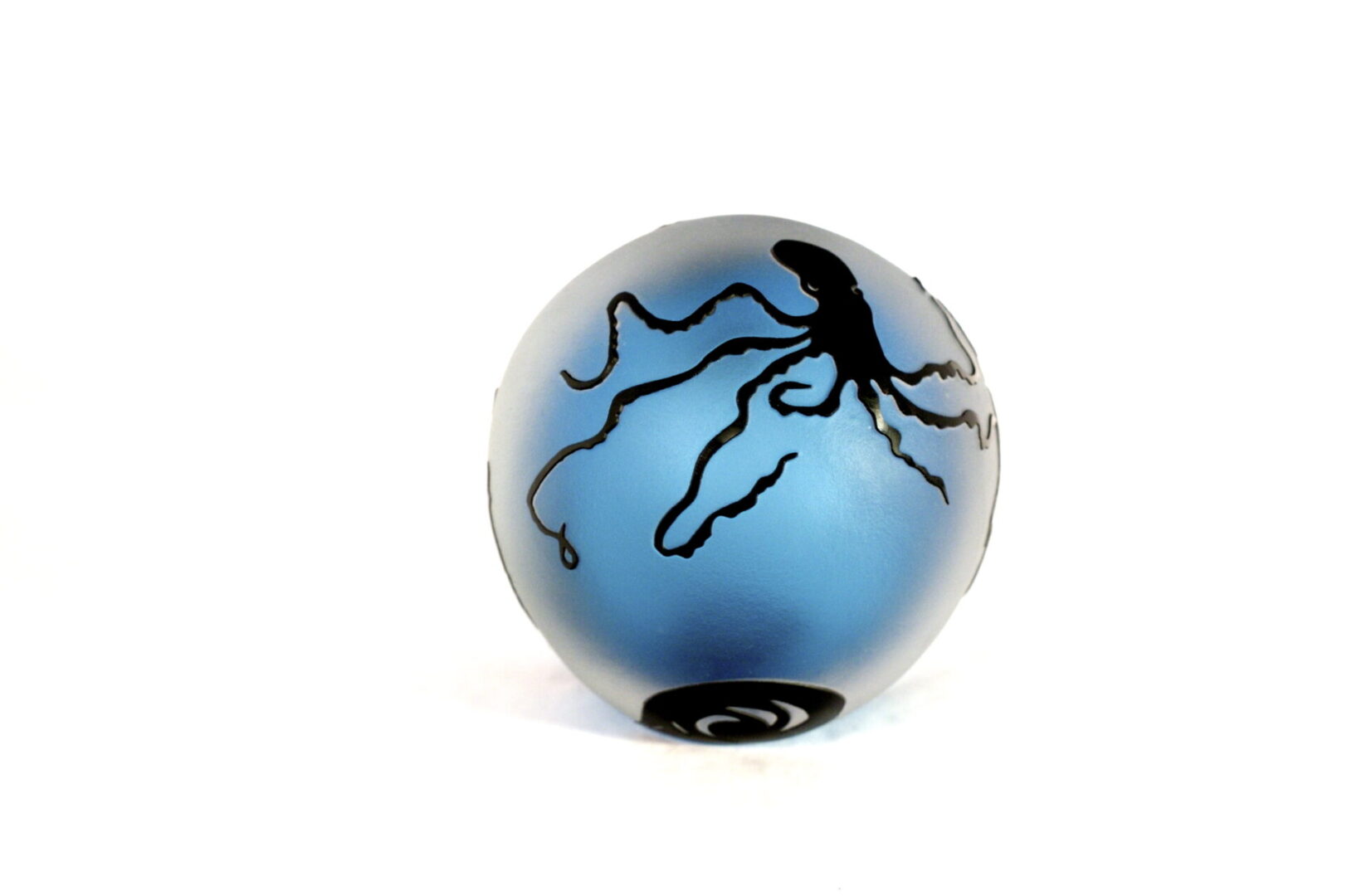 A blue ball with an octopus on it.