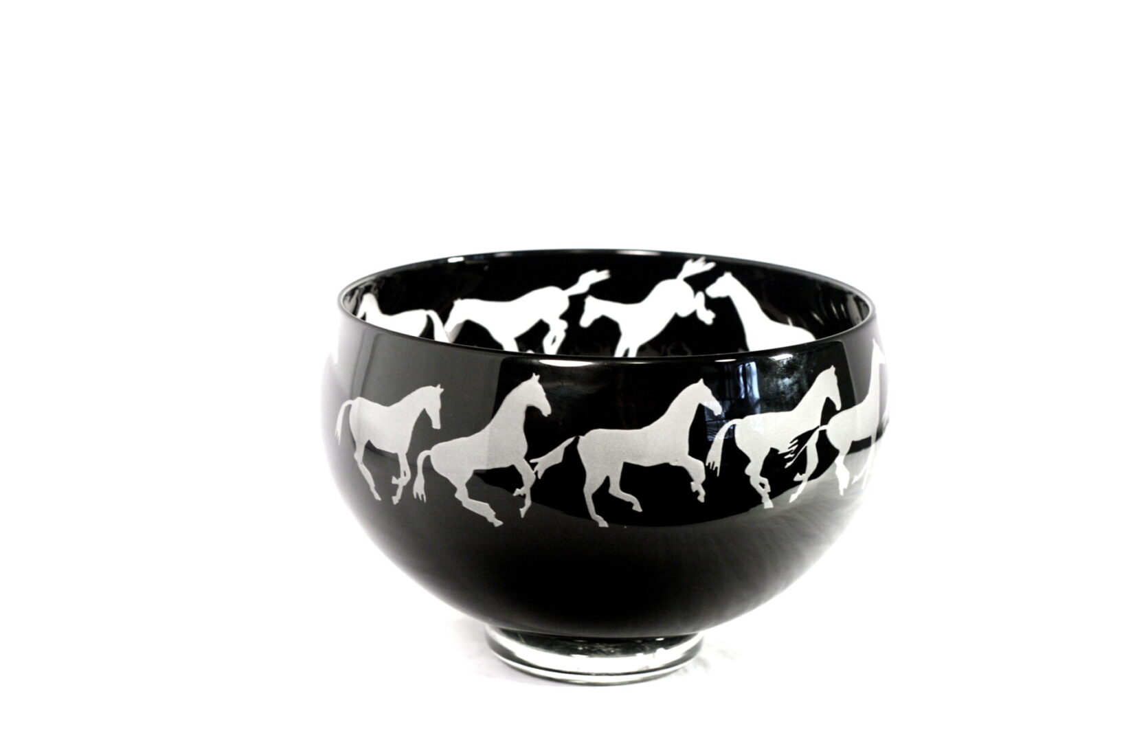 A bowl with horses on it