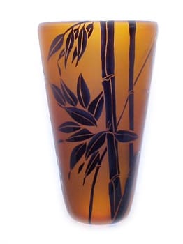 A vase with bamboo design on it.