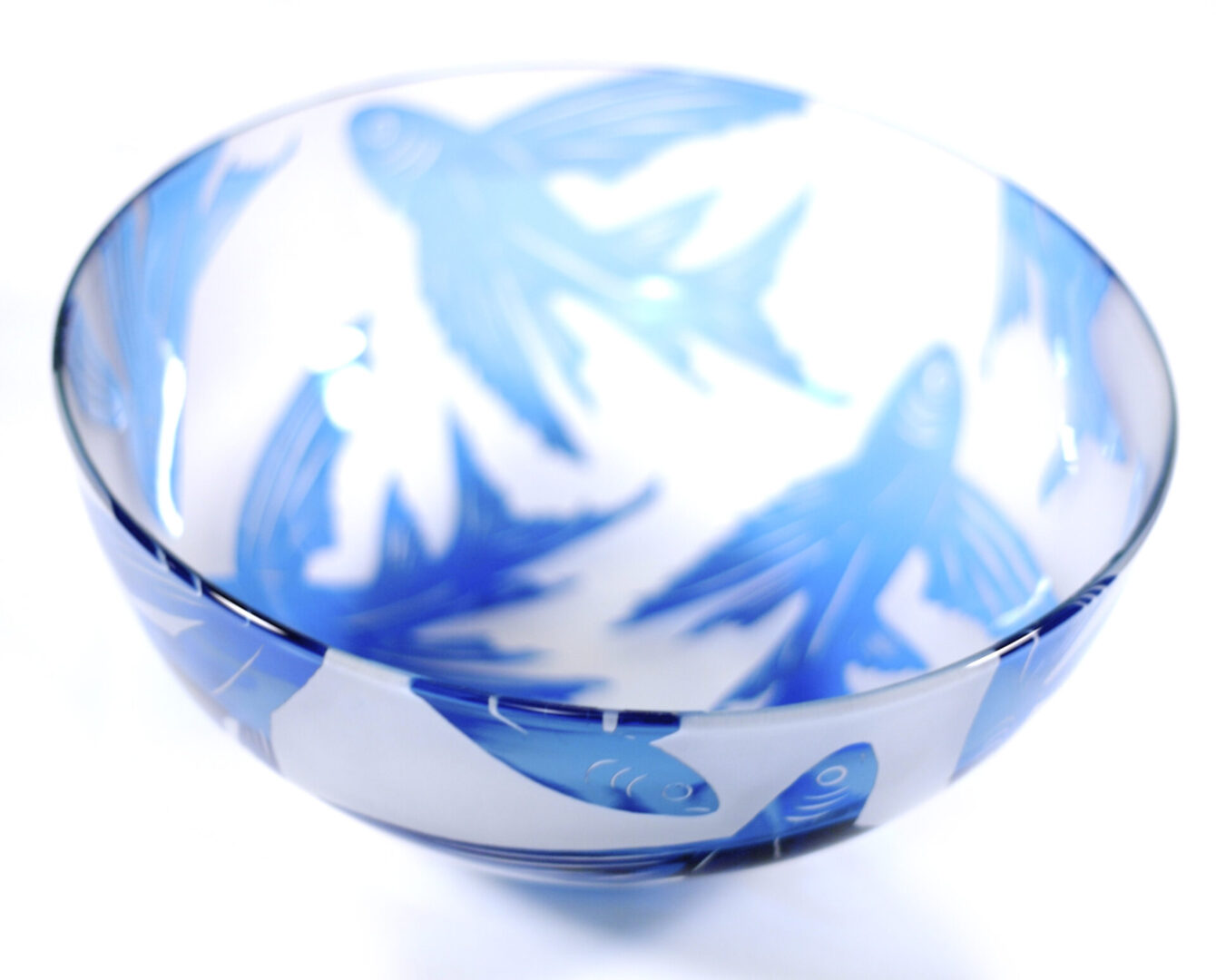 A bowl with blue and white design on it.
