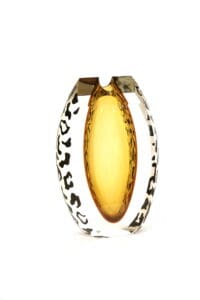 A glass object with leopard print on it.