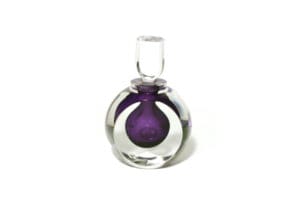 A purple glass bottle with a round base.