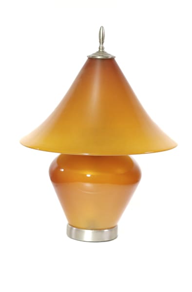 A lamp that is sitting on top of a table.