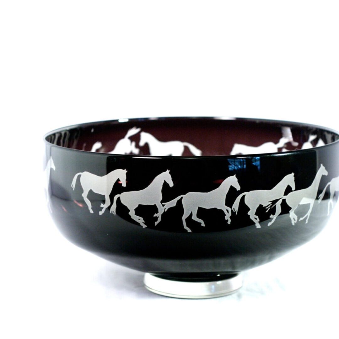 A bowl with horses on it